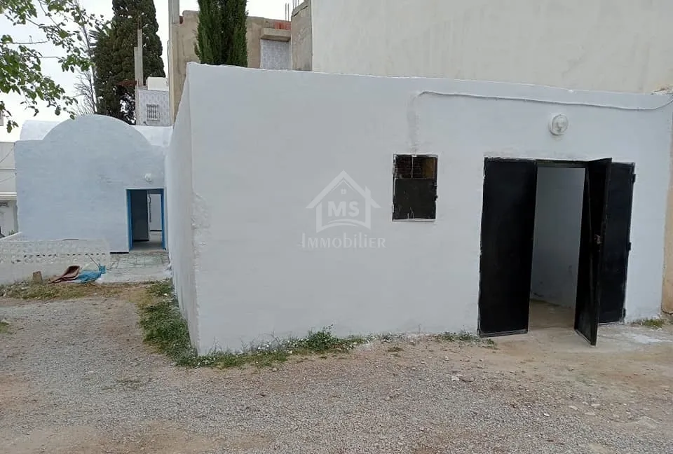  Une maison arabe avec garage à vendre à Hammamet 51355351 