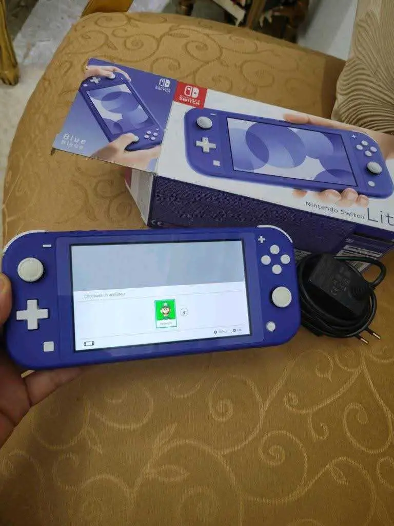  nintendo switch lite avec paquet et chargeur dorigine 