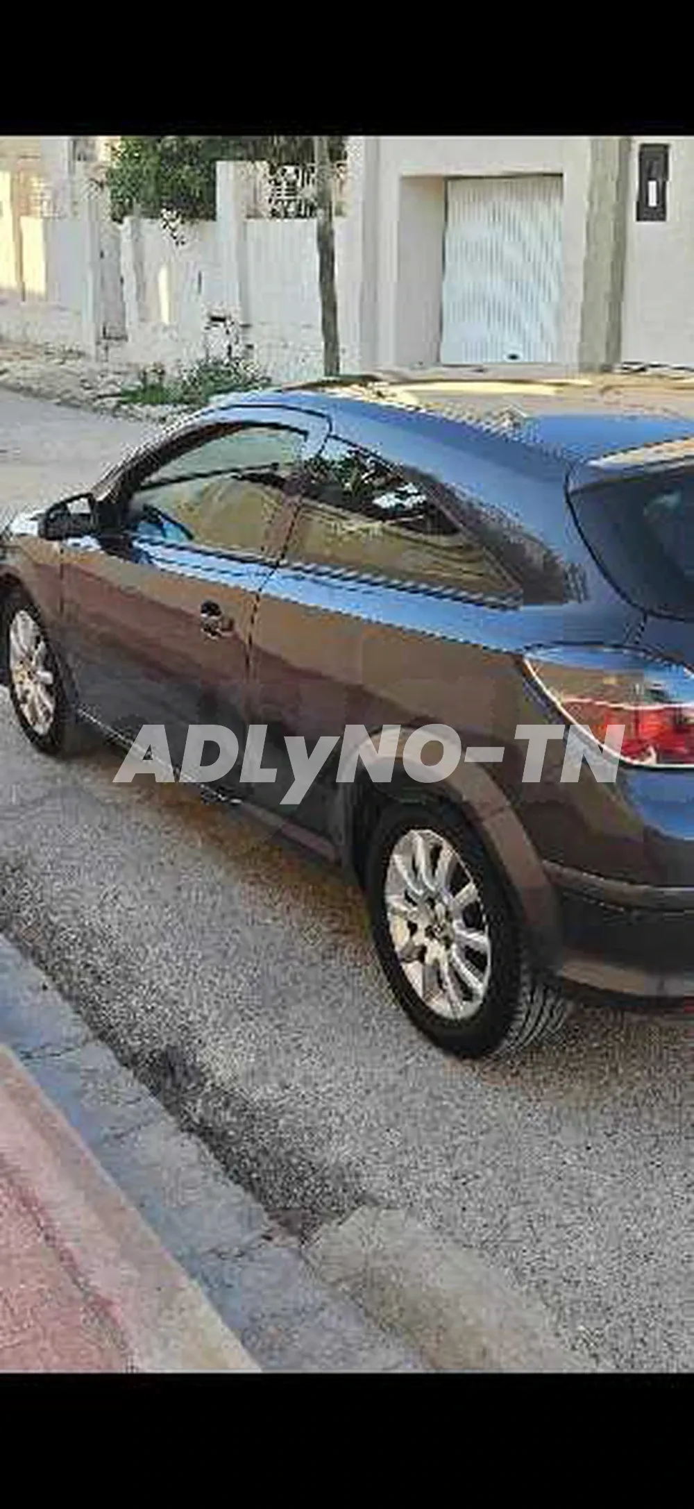 Une jolie opel astra h gtc 1.4 essence