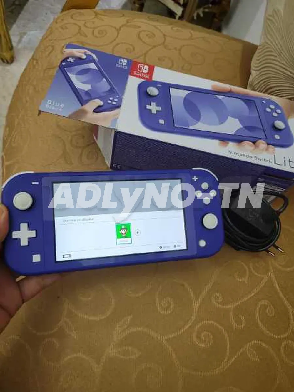 nintendo switch lite non patchée avec paquet et chargeur dorigine prix 430d