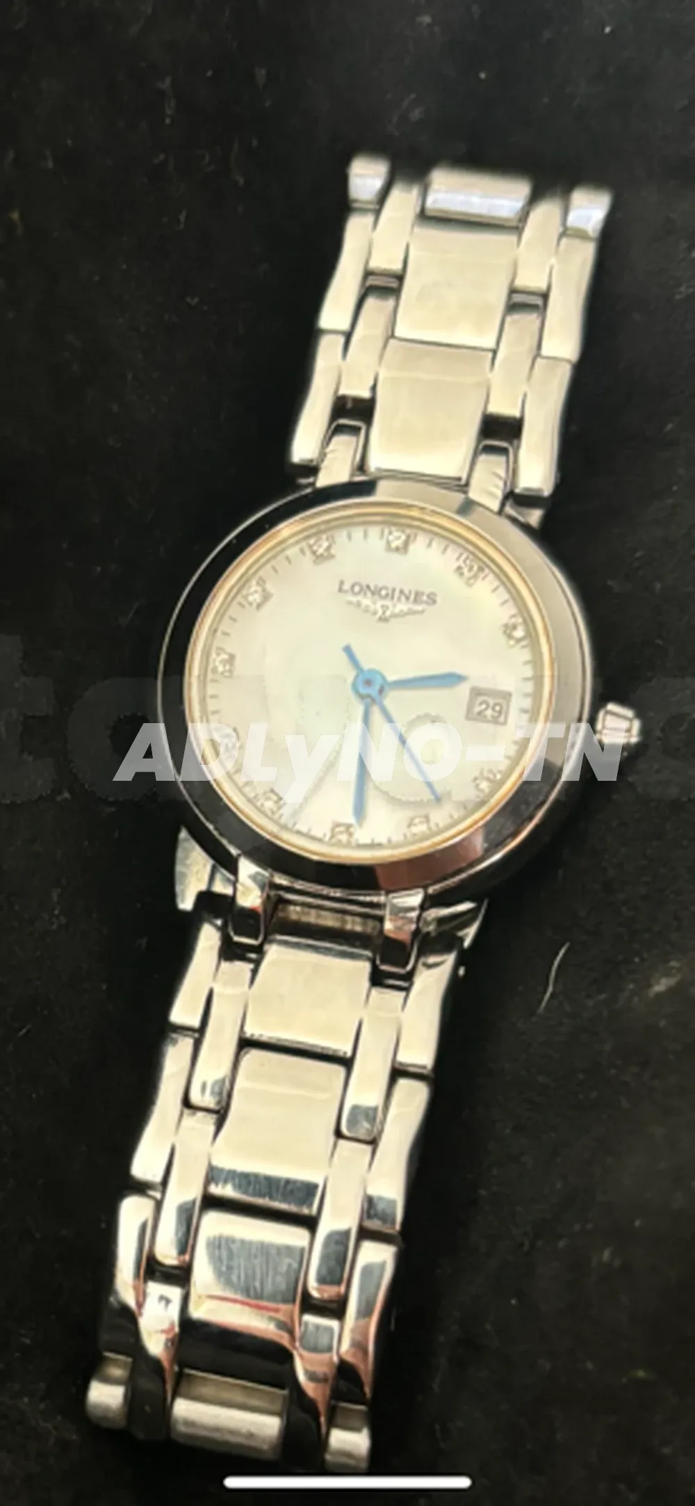 montre femme LONGINES avec diamants